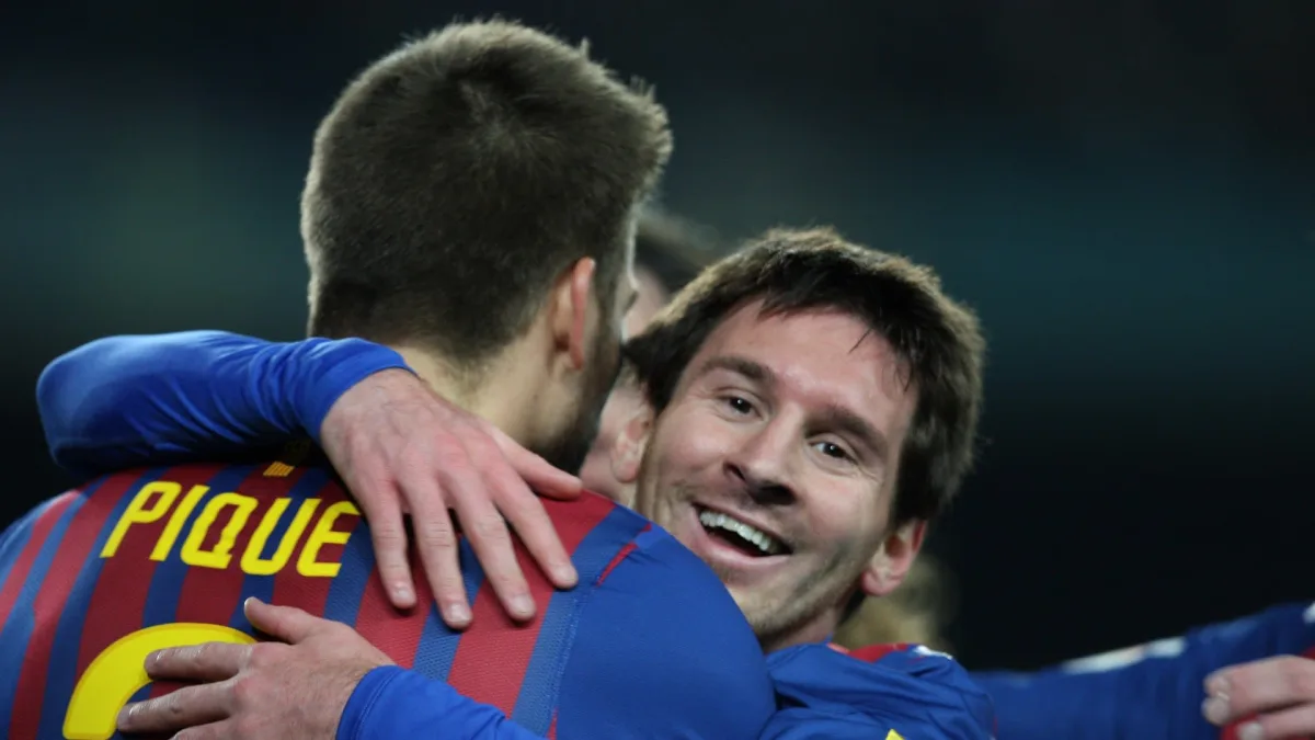Lionel Messi and Gerard Pique celebrating for Barcelona