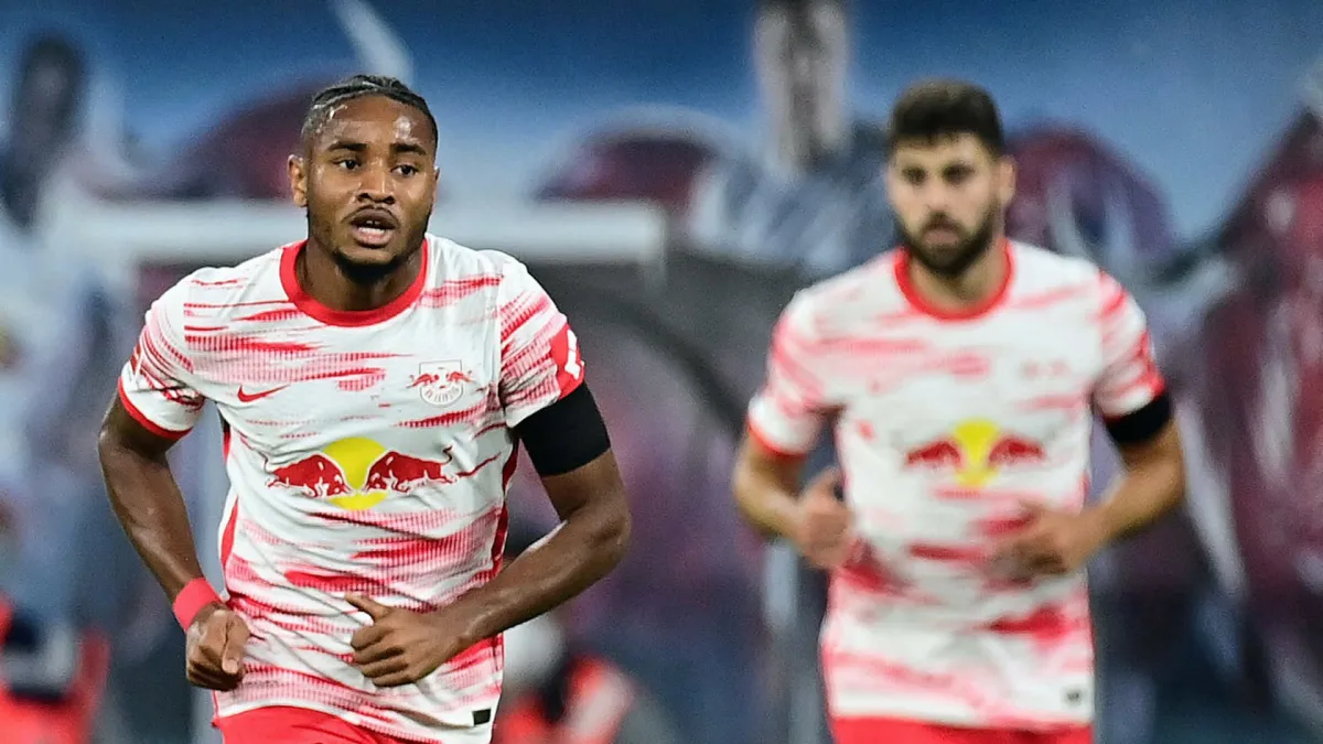 Nkunku and Gvardiol in action for RB Leipzig.