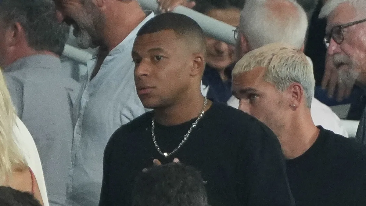 Kylian Mbappe watches France v New Zealand in the Rugby World Cup