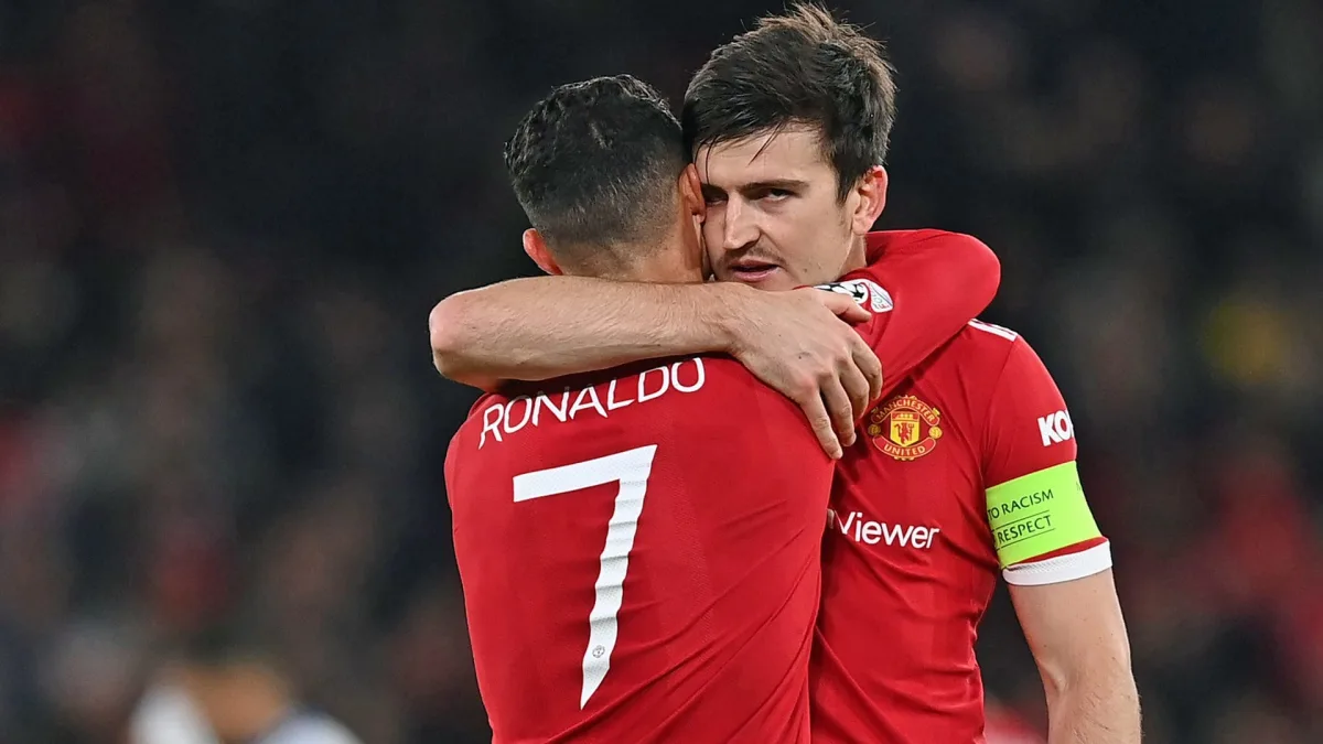 Cristiano Ronaldo and Harry Maguire in action for Man Utd.