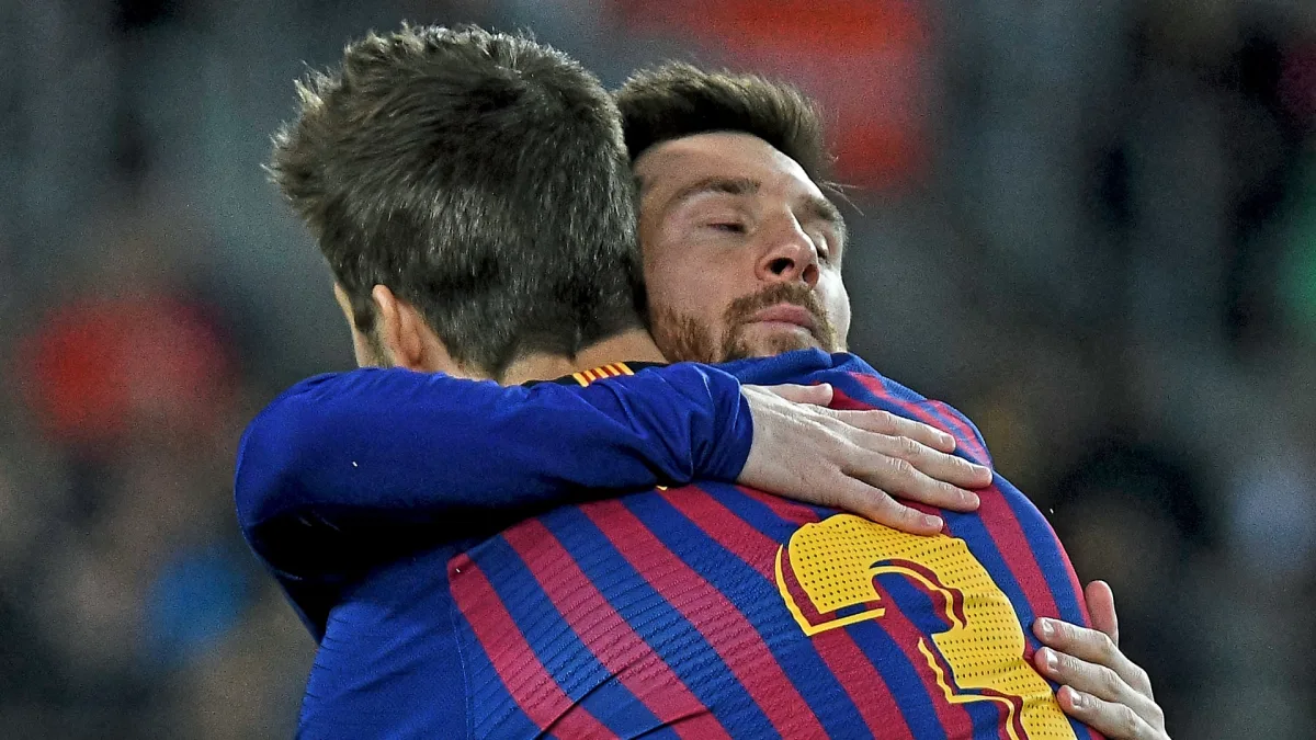 Gerard Pique and Lionel Messi at Barcelona.