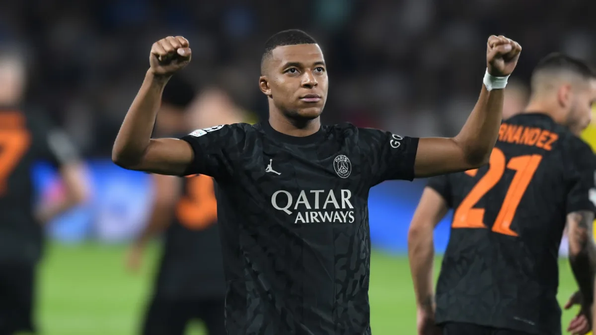 Kylian Mbappe celebrates scoring against Dortmund in the Champions League
