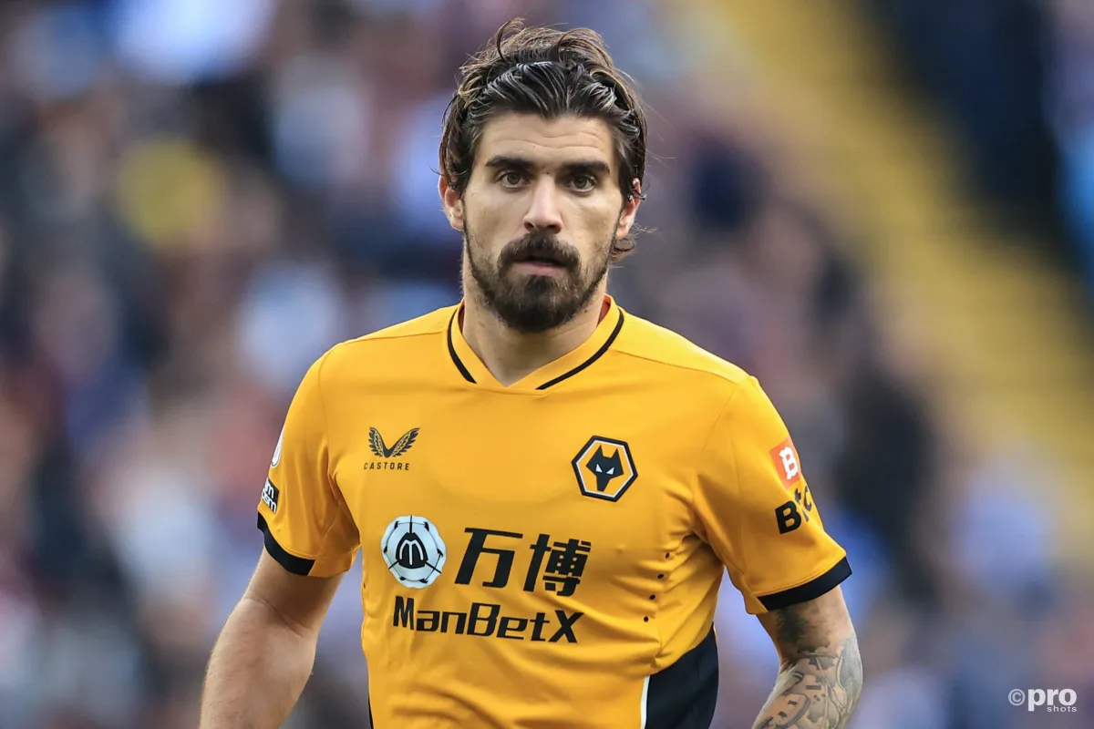 Ruben Neves playing for Wolves in a Premier League match against Aston Villa at Villa Park in 2021