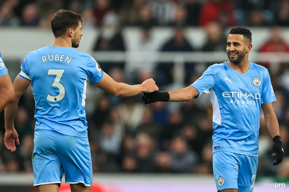 Riyad Mahrez and Ruben Dias celebrate for Manchester City in EPL 2021/22