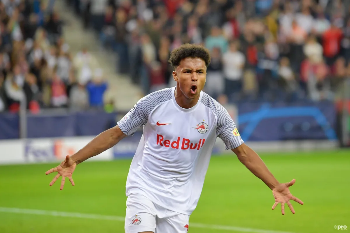 Karim Adeyemi celebrates scoring in the Champions League against Wolfsburg