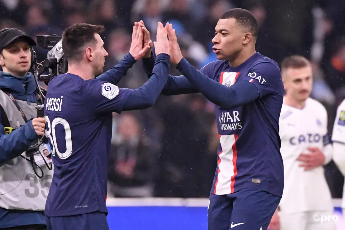 Lionel Messi and Kylian Mbappe celebrating for PSG