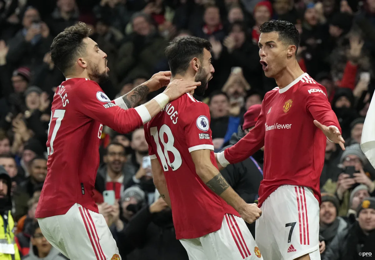 Cristiano Ronaldo and Manchester United players celebrate a goal in the 3-2 win over Arsenal