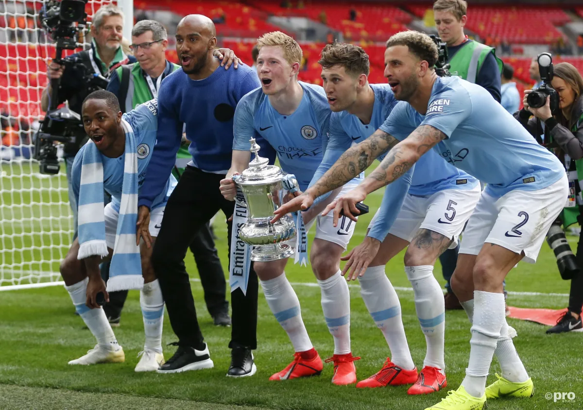 Manchester City players with the FA Cup.