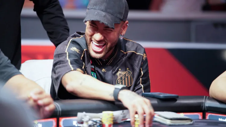 Neymar playing poker in a Santos kit