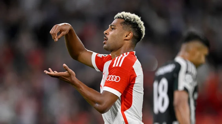 Gnabry celebrates scoring against Man Utd