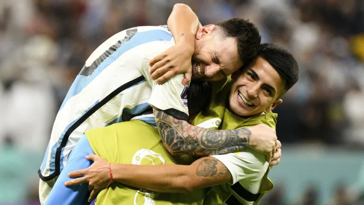 Thiago Almada with Lionel Messi