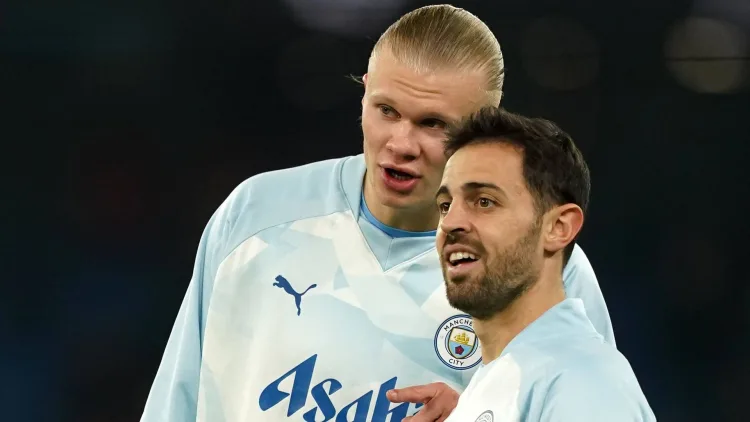 Bernardo Silva (right) with Man City teammate Erling Haaland