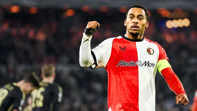 Quinten Timber als aanvoerder van Feyenoord in een Champions League-duel.